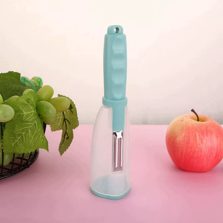 Éplucheur de légumes avec récipient intégré